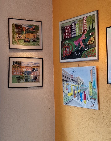 Vier farbenfrohe Bilder in der Ausstellung "urbanes Leben / urbanes Lebensgefühl"